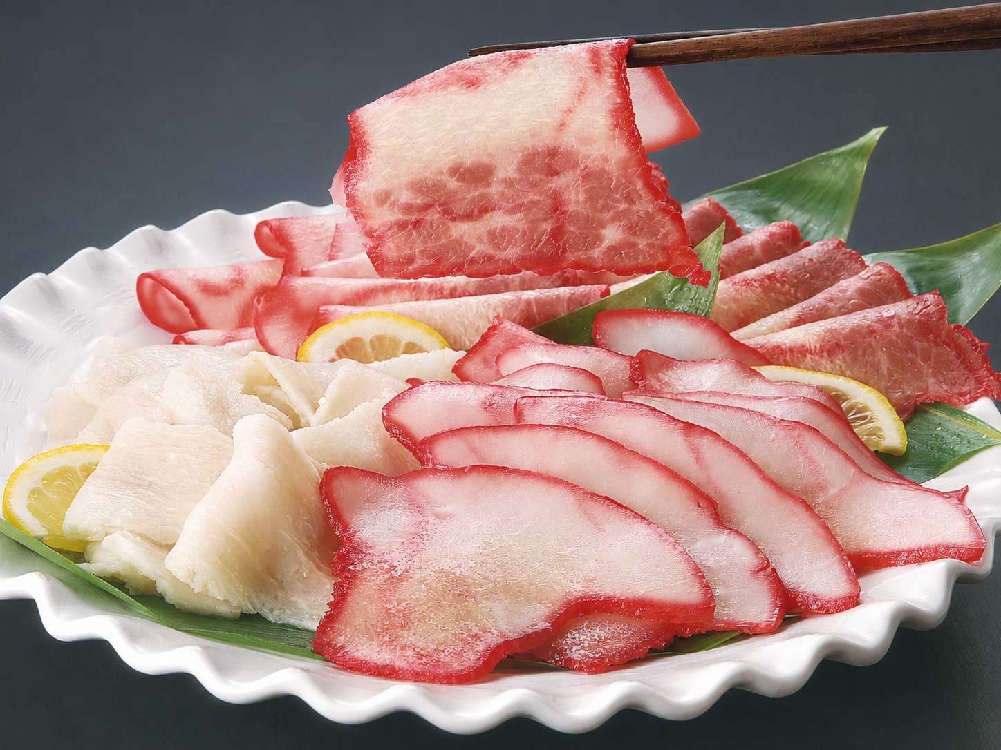 A selection of whale bacon served on a platter